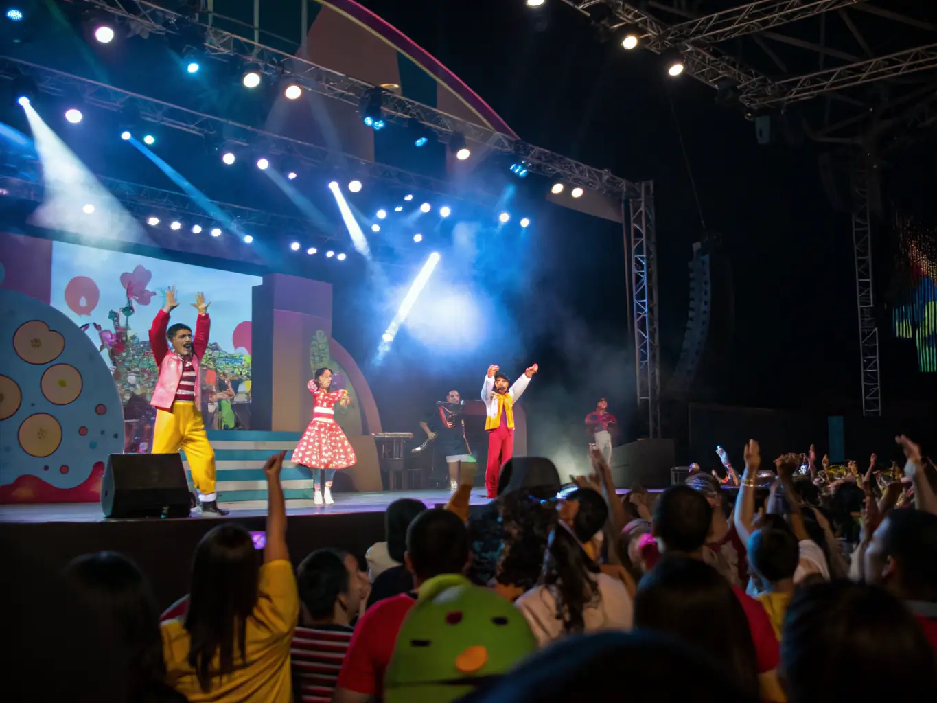 A dynamic live performance event organized by GOURBI PRODUCTIONS, featuring diverse artists and attracting a large audience, highlighting the organization's commitment to cultural dynamism.